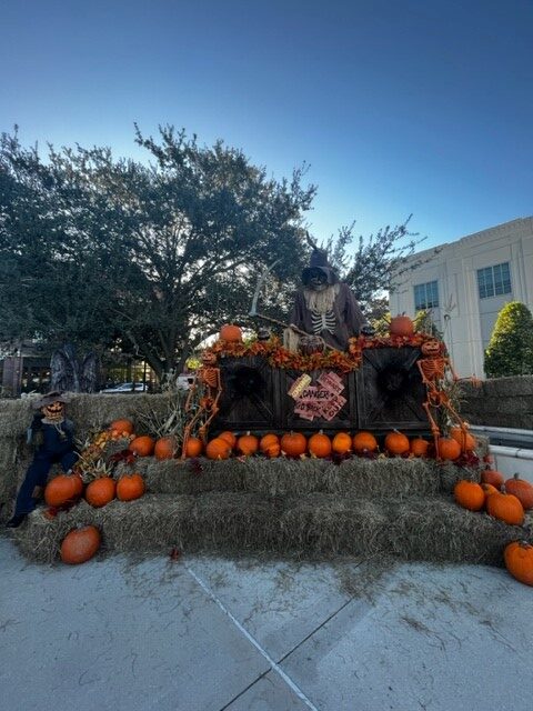 Halloween display with pumpkins and skeletons- Winter Garden- our favorite places for Halloween
